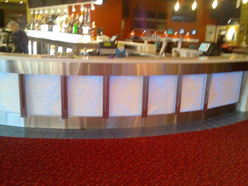 Curved bar with a stainless top in a club