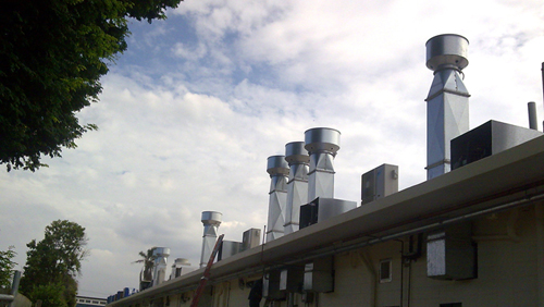 Exhaust fans and ductwork on a roof