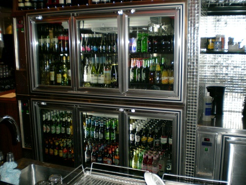 Glass-door drinks fridges stocked with bottles
